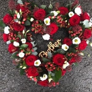 open flower heart for funeral by the dancing daffodil