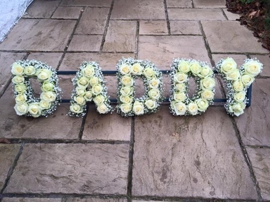 letter tribute rose and gypsophilia for funerals