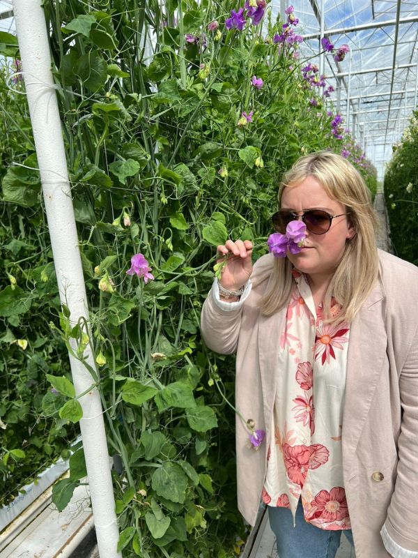 Rachel from TDD smelling sweet peas