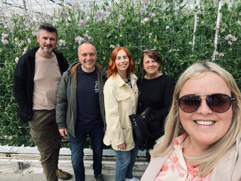 Rachel, Laura and Mama Daff with flower buyers in Holland