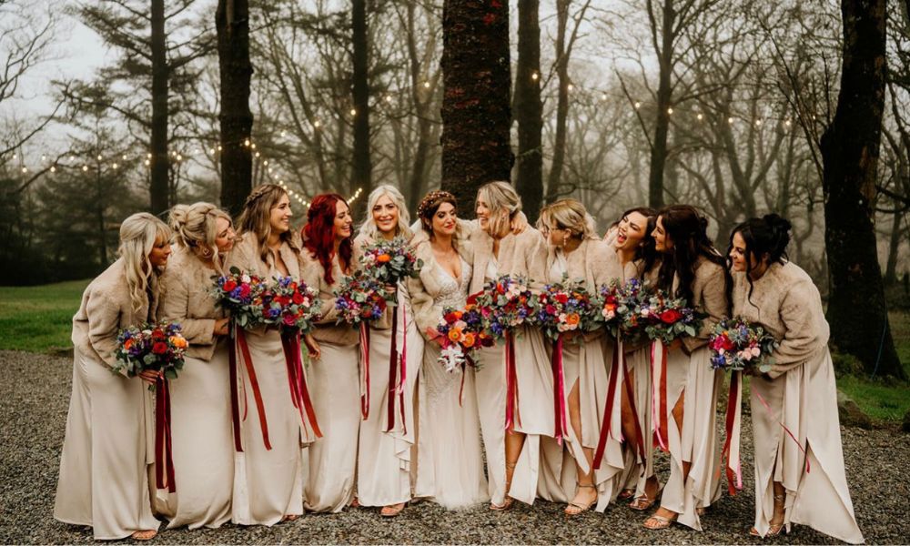 Darcie Phillips and her bridesmaids on her wedding day in the woods