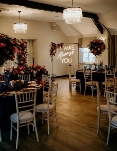 Image of Gellifawr Woodland Retreat function room dressed for Ryan and Darcie's wedding